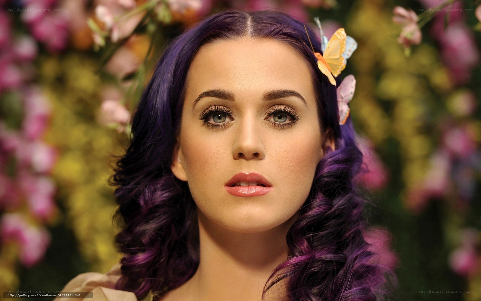 woman with purple hair and butterflies