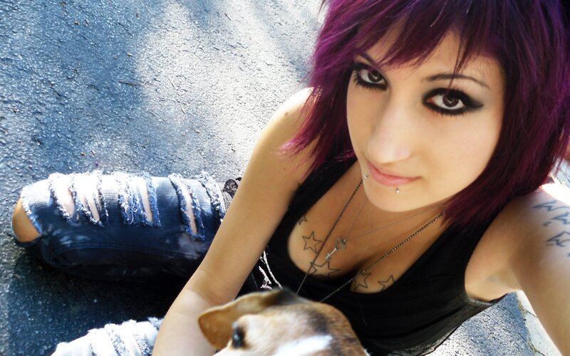 woman with purple hair and dog
