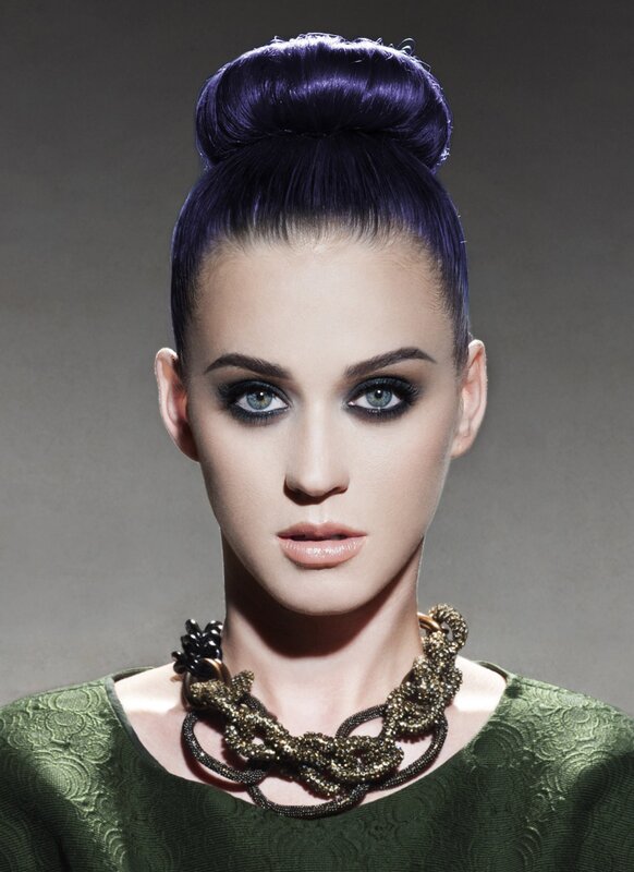 woman with purple hair and dramatic makeup