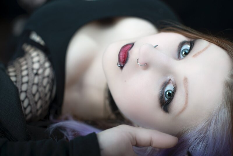 woman with purple hair and piercings