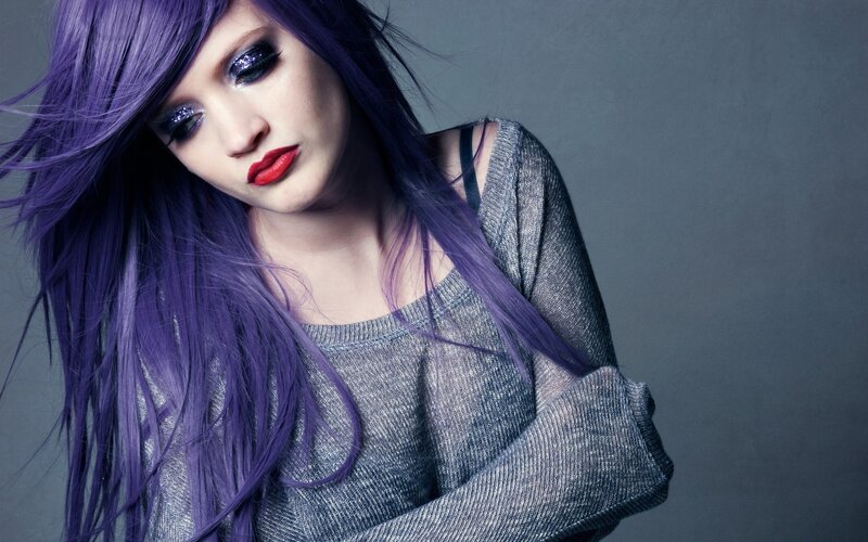 woman with purple hair and red lipstick