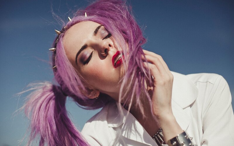 woman with purple hair and spikes