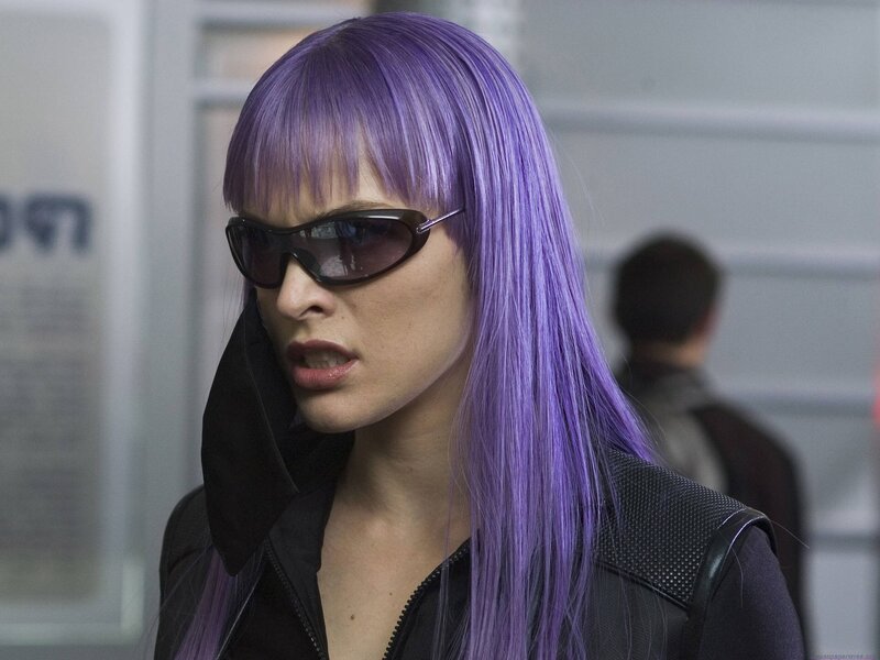 woman with purple hair and sunglasses
