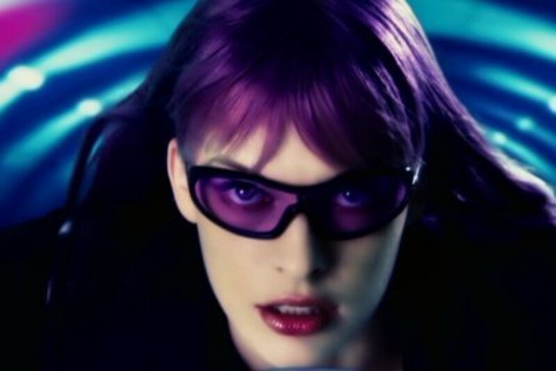 woman with purple hair and sunglasses