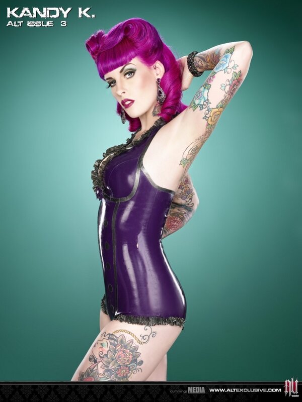 woman with purple hair and tattoos