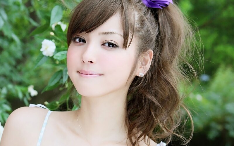 woman with purple hair bow