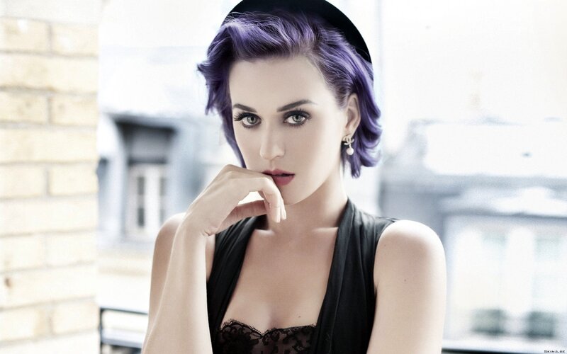 woman with purple hair in black dress