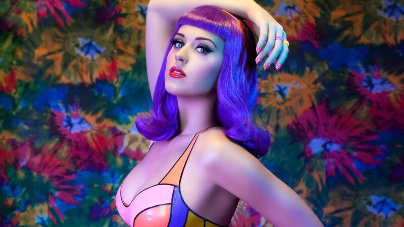 woman with purple hair in colorful setting