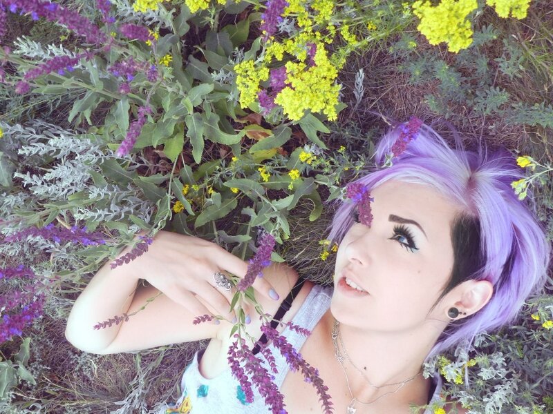 woman with purple hair in flowers