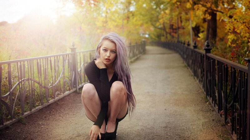 woman with purple hair on a path