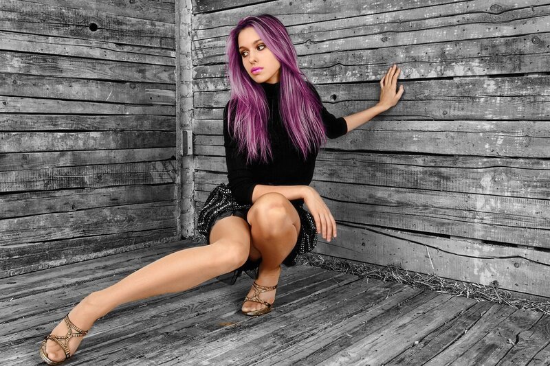 woman with purple hair posing