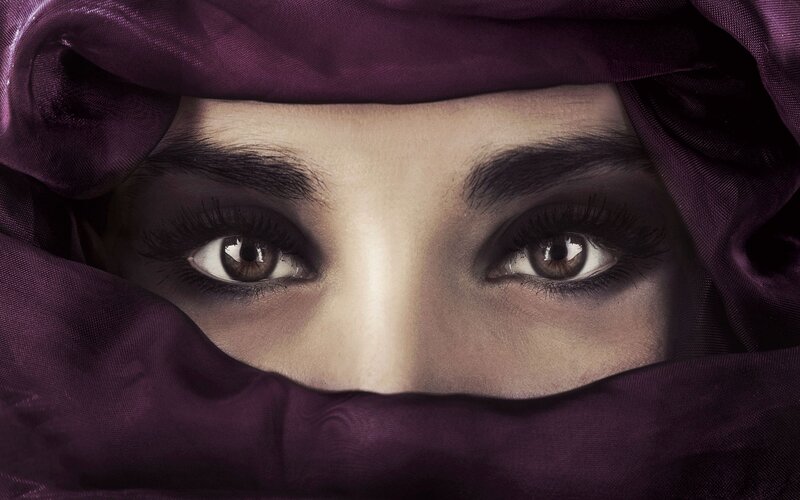 woman with purple headscarf