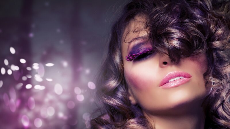woman with purple makeup