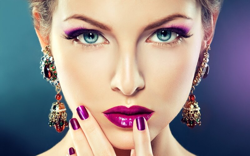 woman with purple makeup