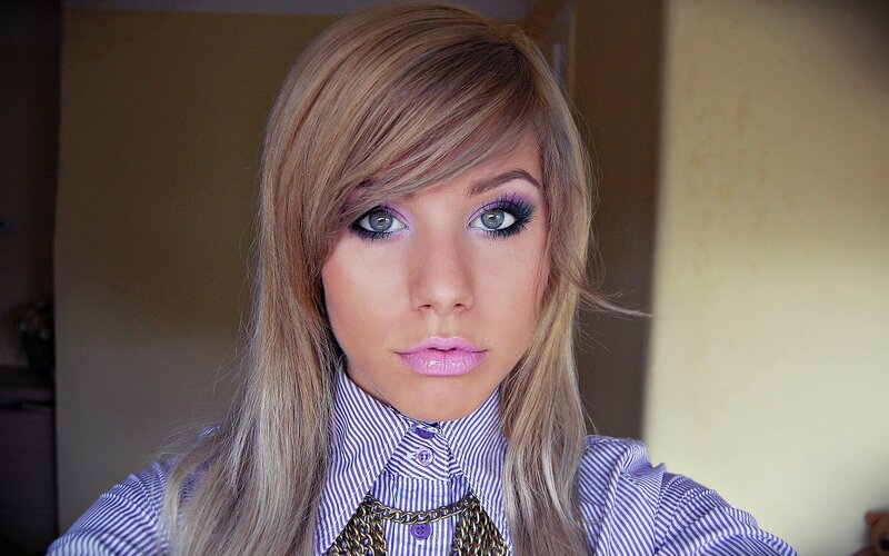 woman with purple makeup