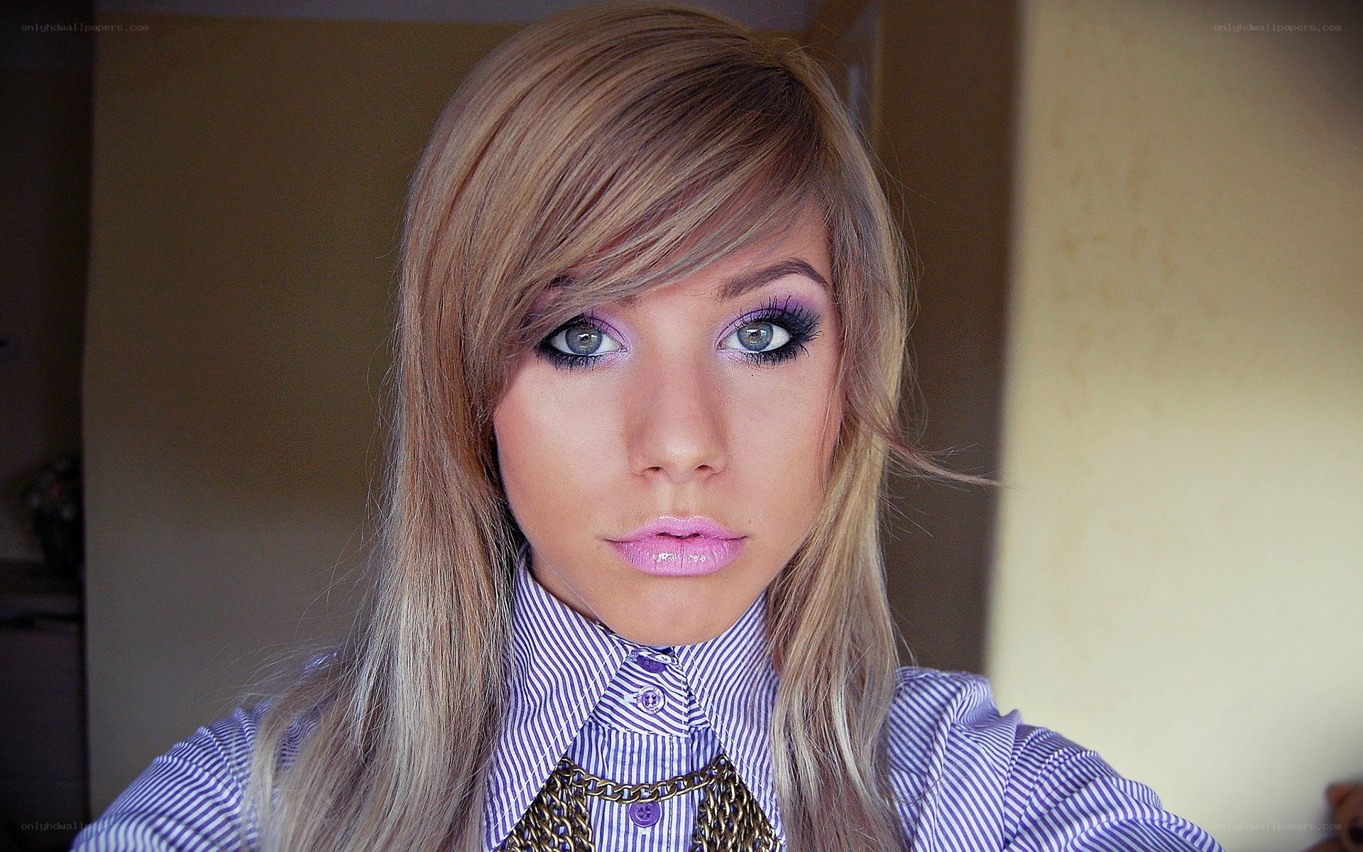 woman with purple makeup