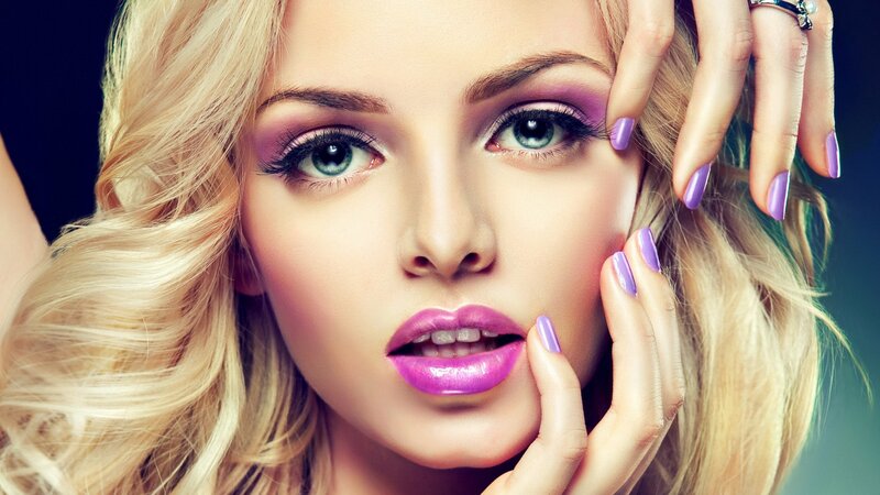 woman with purple makeup