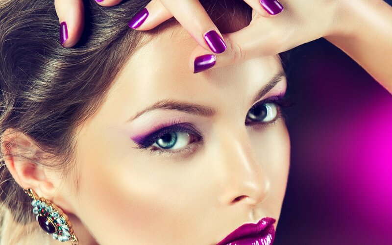 woman with purple makeup