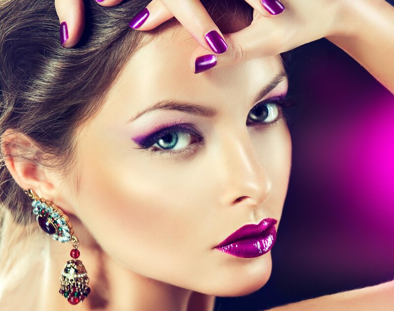 woman with purple makeup