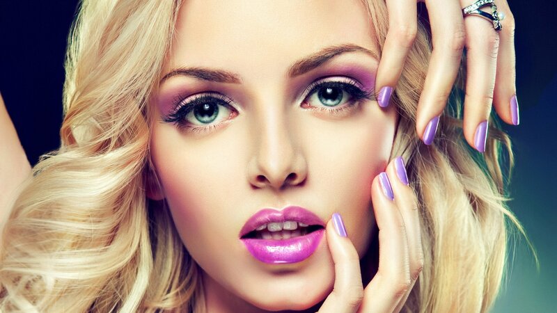 woman with purple makeup