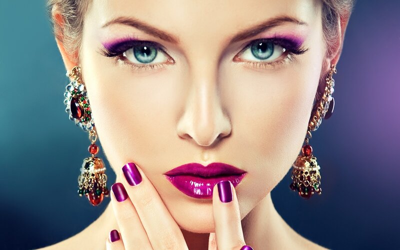 woman with purple makeup