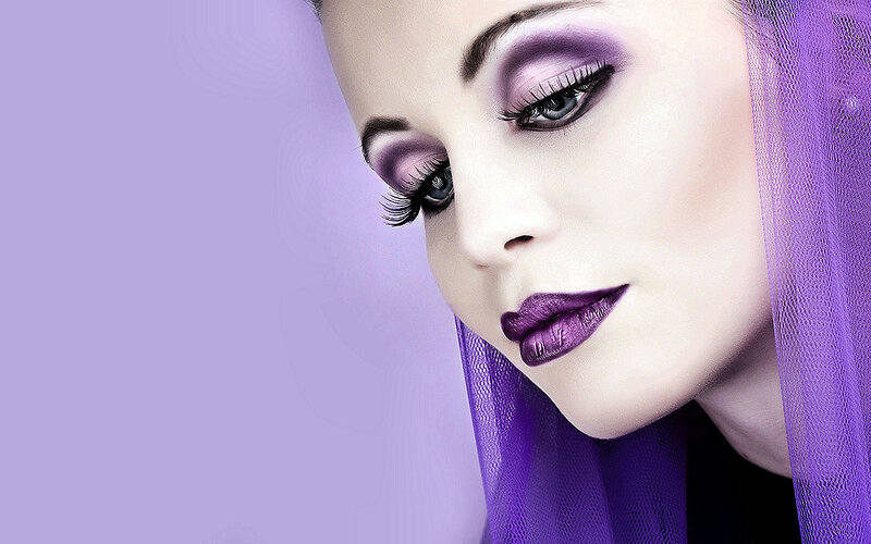 woman with purple makeup