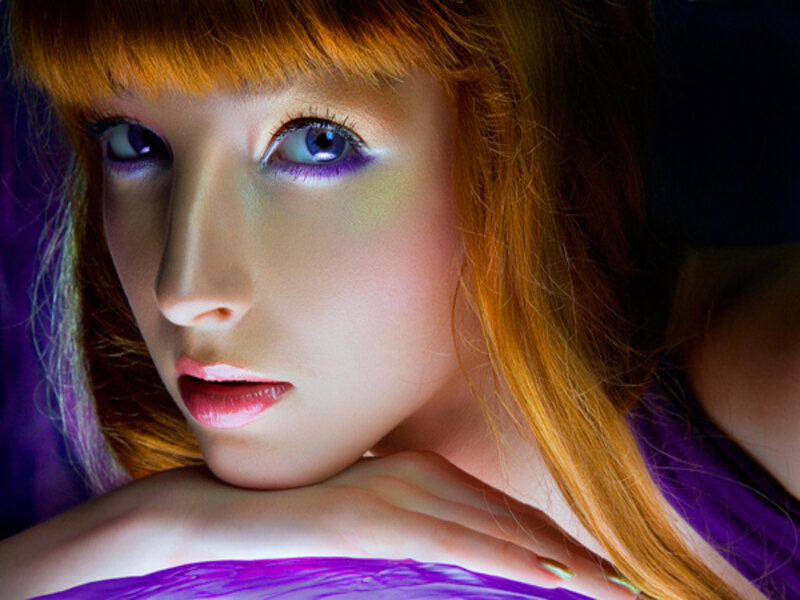 woman with purple makeup