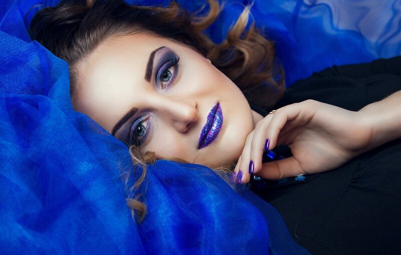 Woman with Purple Makeup — Blue