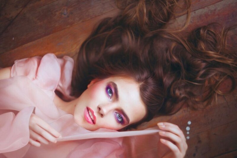 Woman with Purple Makeup — Brown