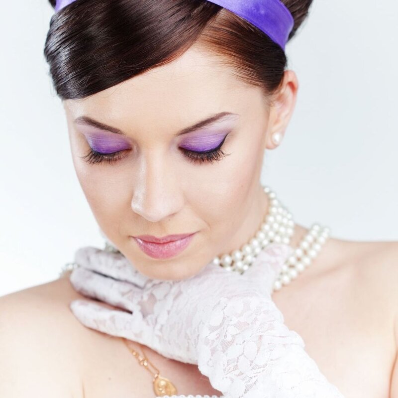 Woman with Purple Makeup — Elegant
