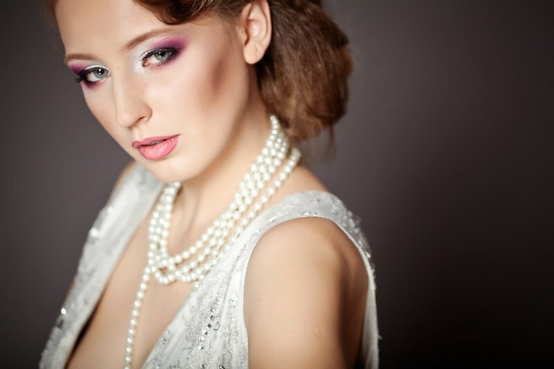 Woman with Purple Makeup — White, Dramatic