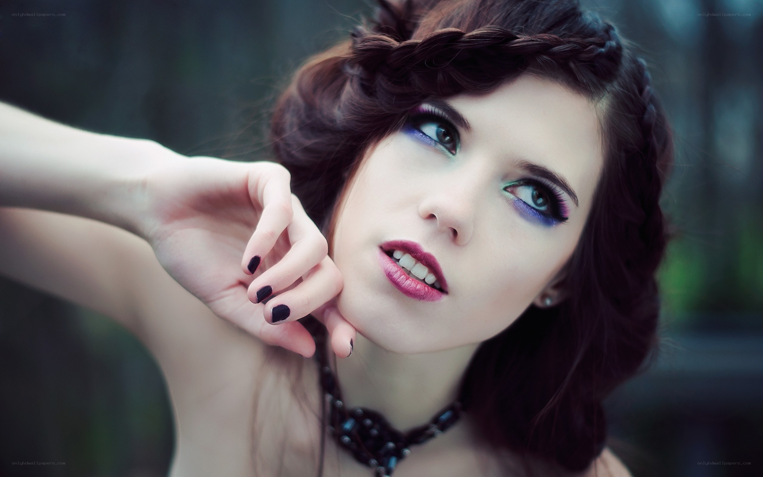 woman with purple makeup