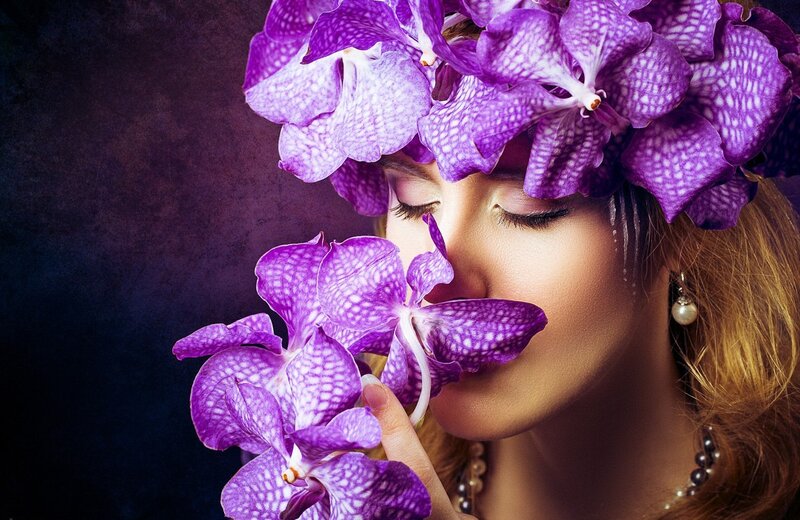 Woman with Purple Orchids — Dramatic, Photograph