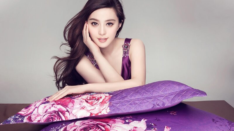 woman with purple pillow