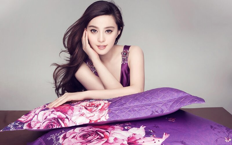 woman with purple pillow