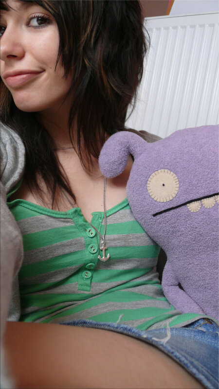 woman with purple plush toy