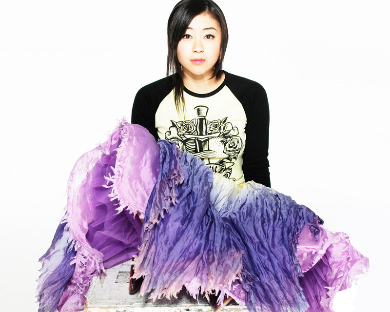 woman with purple skirt