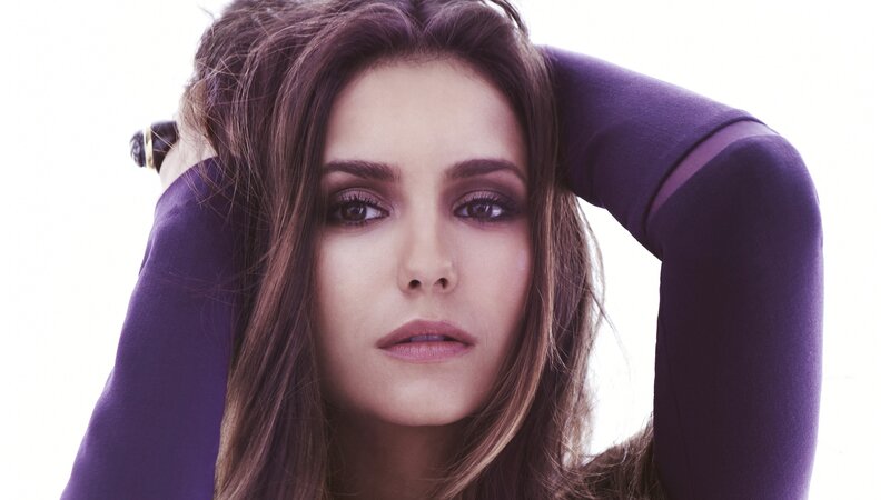 Woman with Purple Top — Serious, Photograph