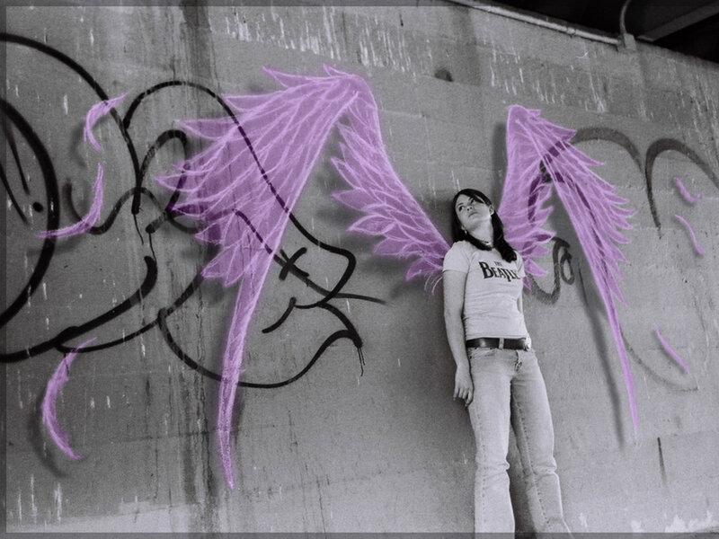 woman with purple wings graffiti