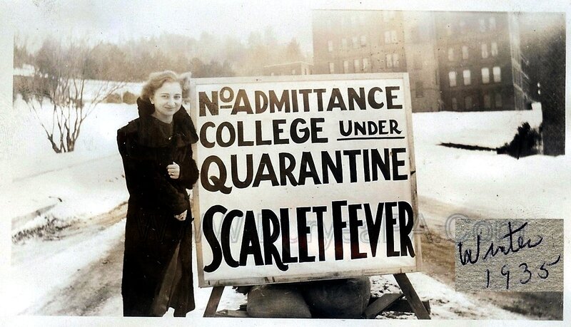 Woman with quarantine sign