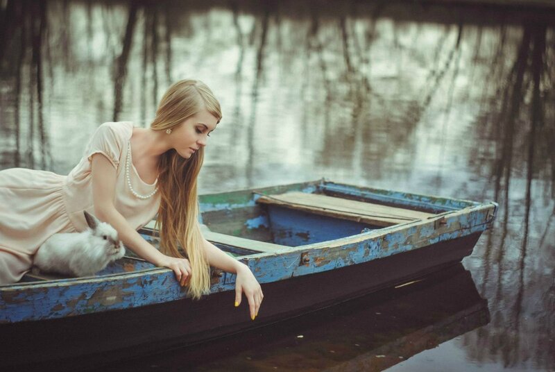 Woman with Rabbit in Boat