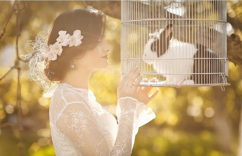 Woman with Rabbit in Cage