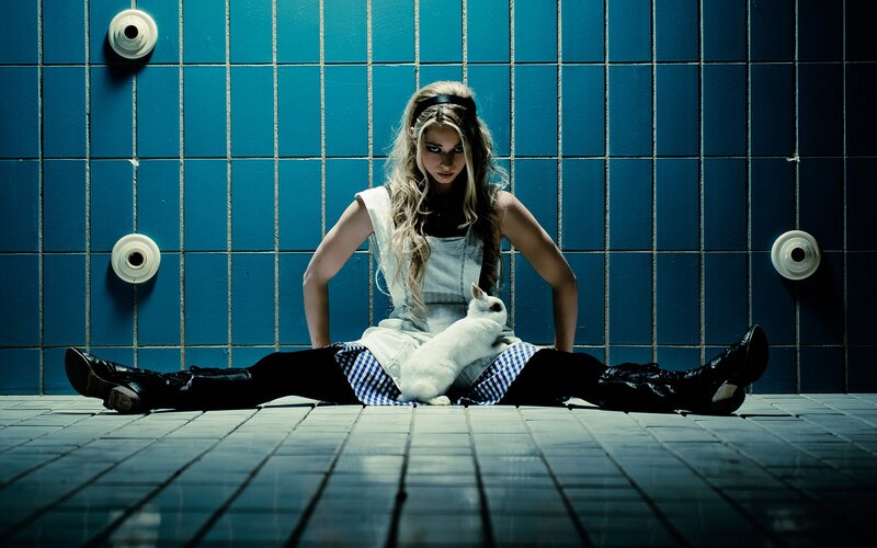 woman with rabbit in tiled room