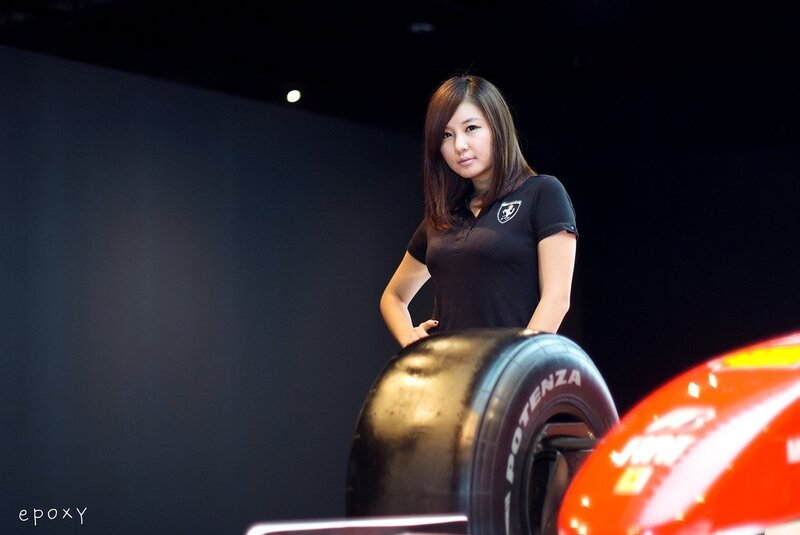 woman with race car tire