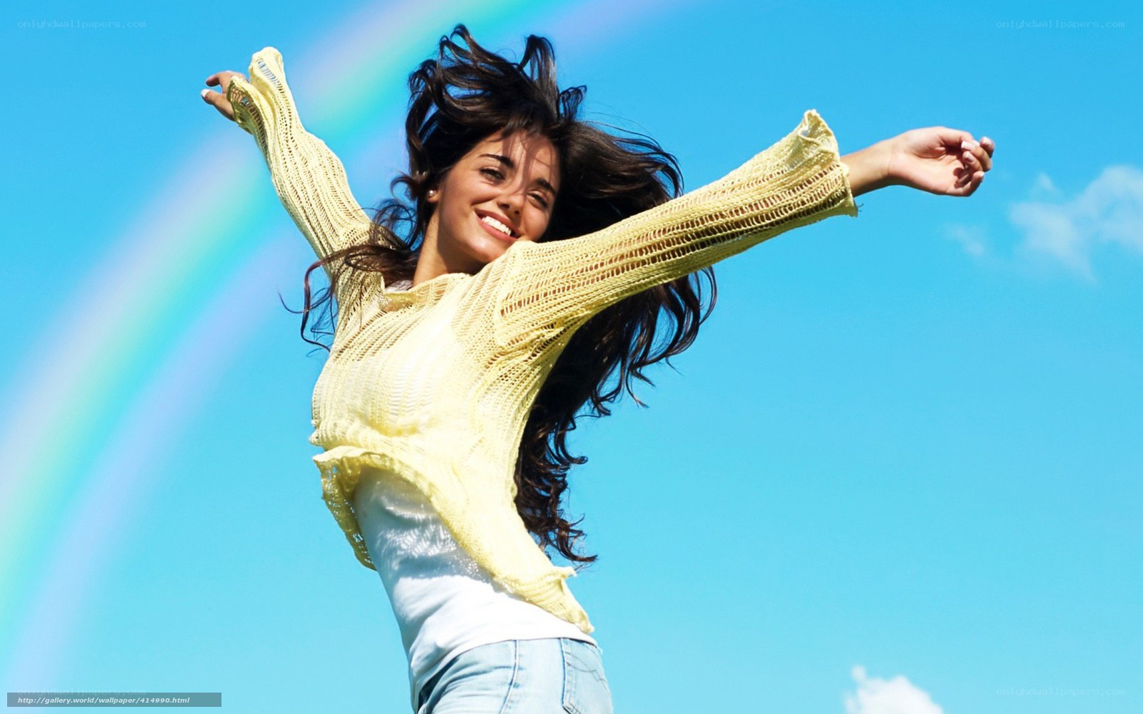 woman with rainbow background