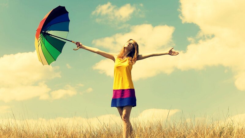woman with rainbow umbrella
