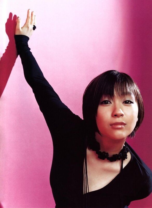 woman with raised arm