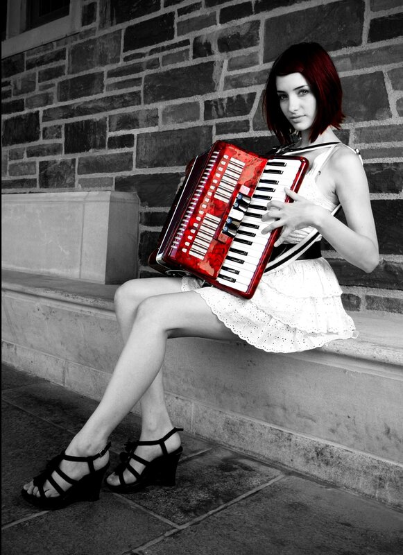 Woman with red accordion