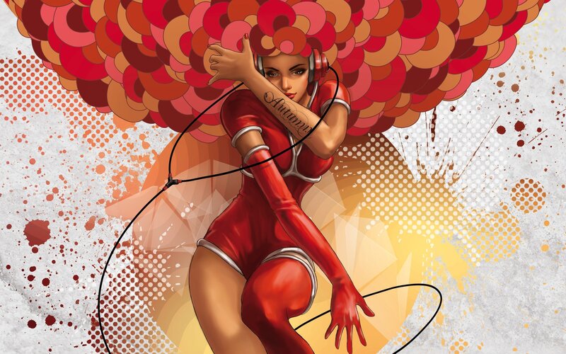 woman with red afro and headphones