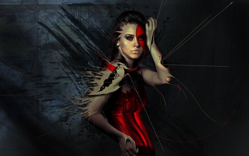 woman with red and black face art
